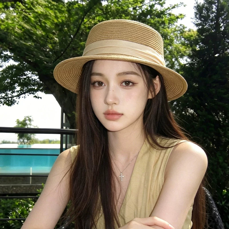 2026 new French woven flat top straw hat for women's summer sun shading and beach vacation weaving gift hat