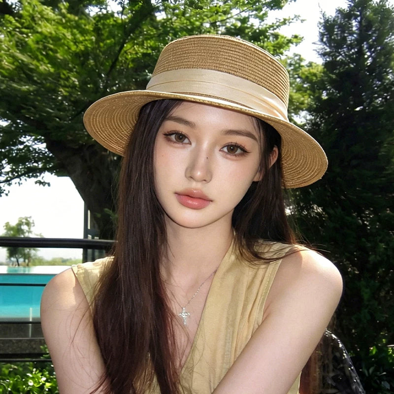 2026 new French woven flat top straw hat for women's summer sun shading and beach vacation weaving gift hat