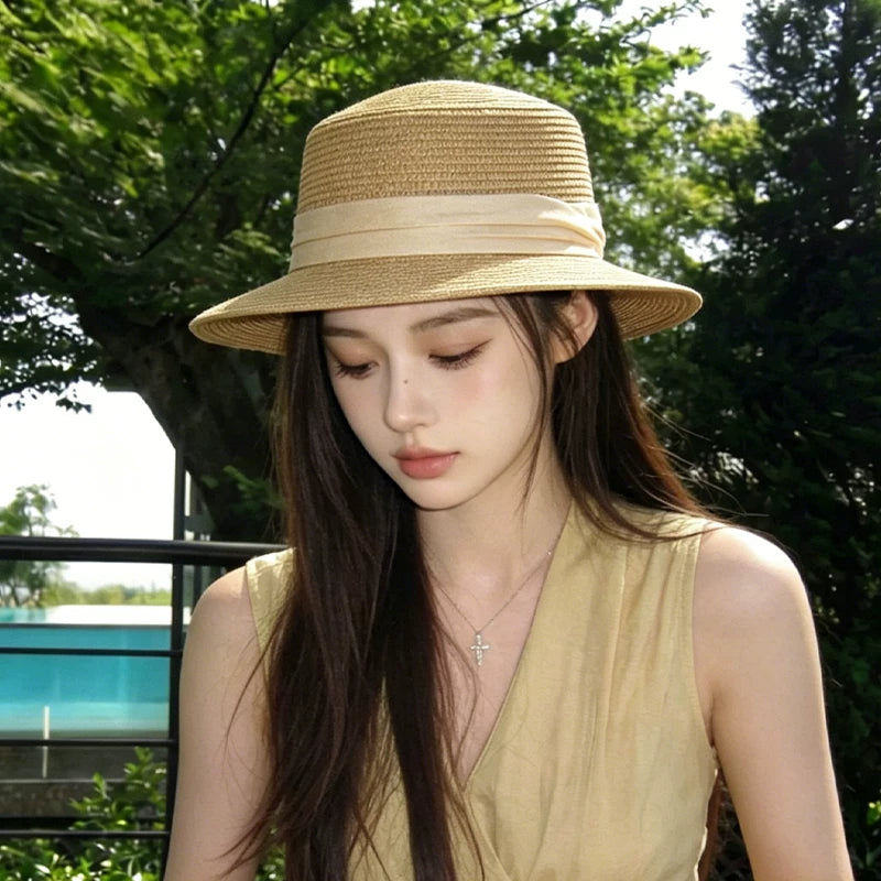 2026 new French woven flat top straw hat for women's summer sun shading and beach vacation weaving gift hat